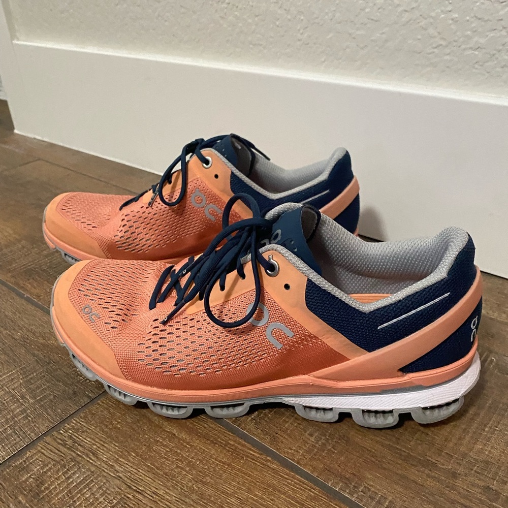 On Clouds coral and dark blue. Worn maybe 5-10 times.